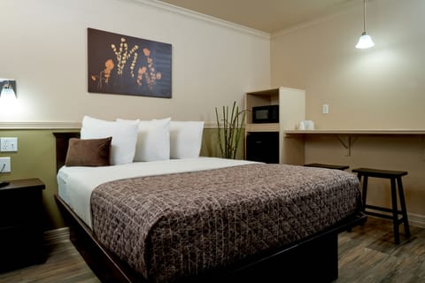 2 Queen Main Building Upstairs | Blackout drapes, soundproofing, rollaway beds, free WiFi