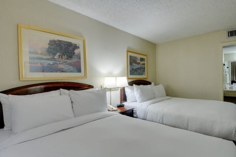Standard Room, 2 Queen Beds | Premium bedding, down comforters, desk, blackout drapes