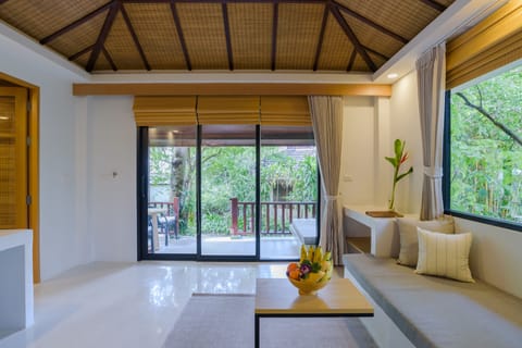 Deluxe Villa, 1 Bedroom, Pool View, Poolside | Living room | 32-inch LCD TV with satellite channels, TV, table tennis