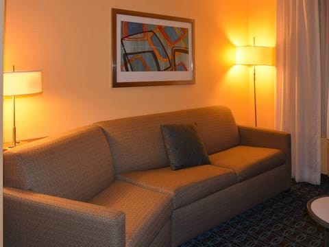 Desk, laptop workspace, blackout drapes, iron/ironing board