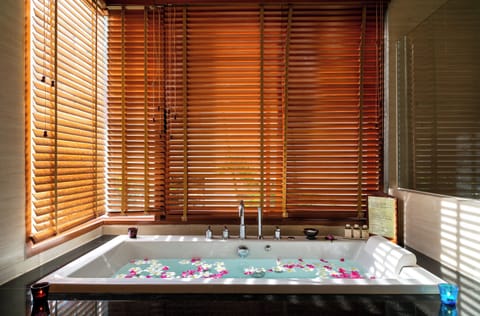 Separate tub and shower, jetted tub, rainfall showerhead