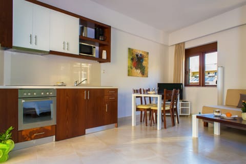 Comfort Suite, 1 Bedroom | Private kitchen | Full-size fridge, microwave, oven, stovetop