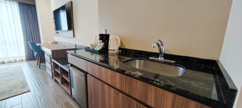 Deluxe Room, Multiple Beds, Non Smoking | In-room safe, desk, laptop workspace, blackout drapes