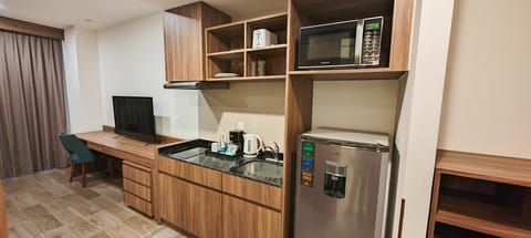 Premium Room One Queen Bed | In-room safe, desk, laptop workspace, blackout drapes