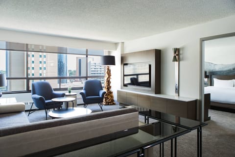 Suite, 1 Bedroom, City View, Corner | Living area | 47-inch Smart TV with cable channels, TV, Netflix