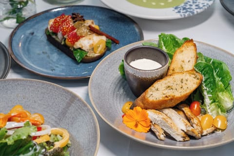 Breakfast, lunch, dinner served; beach views