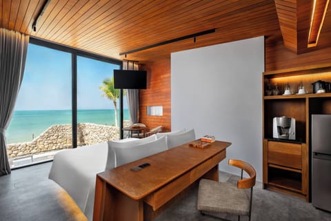 Beachfront pool villa | Minibar, in-room safe, individually decorated, individually furnished