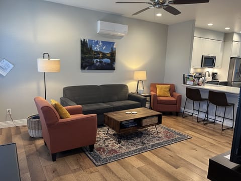 Open floor plan between living room and kitchen. 