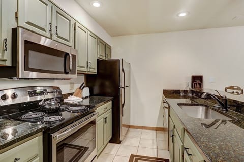Condo, 2 Bedrooms | Private kitchen | Fridge, microwave, oven, dishwasher