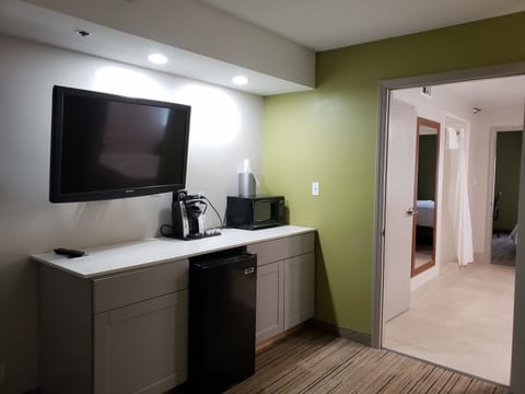 Suite, 1 Bedroom | Living area | TV