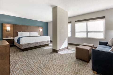 Suite, 1 King Bed, Non Smoking | Premium bedding, down comforters, pillowtop beds, in-room safe
