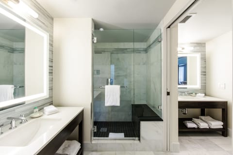 Luxury Suite, Pool View | Bathroom | Rainfall showerhead, designer toiletries, hair dryer, bathrobes