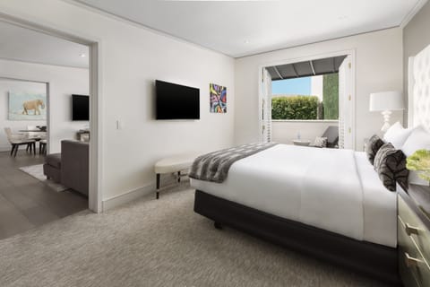 Luxury Suite, Pool View | Premium bedding, in-room safe, desk, laptop workspace
