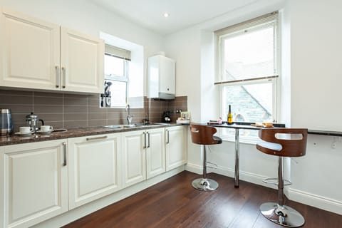 Comfort Apartment | Private kitchen | Full-size fridge, microwave, oven, stovetop