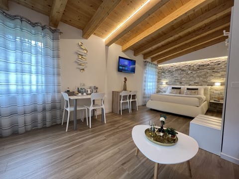 Superior Quadruple Room, Garden Area | Soundproofing, free cribs/infant beds, free WiFi, bed sheets