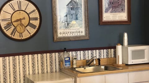 32-inch flat-screen TV with satellite channels, books