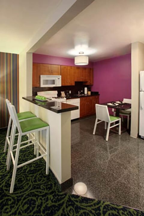 Studio Suite, 1 King Bed, Kitchen | Private kitchen | Fridge, microwave, coffee/tea maker