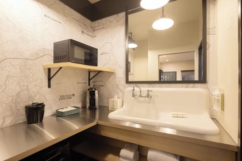 Eco-friendly toiletries, hair dryer, towels, soap