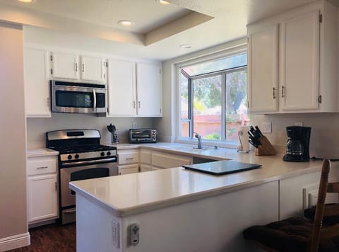 Fully stocked kitchen with toaster oven, Keurig & Mr. Coffee coffee makers