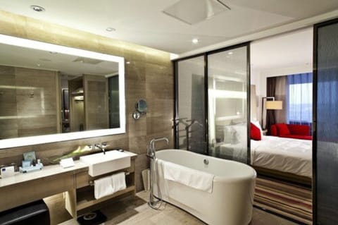 Family Room, Multiple Beds | Bathroom | Eco-friendly toiletries, hair dryer, bathrobes, towels