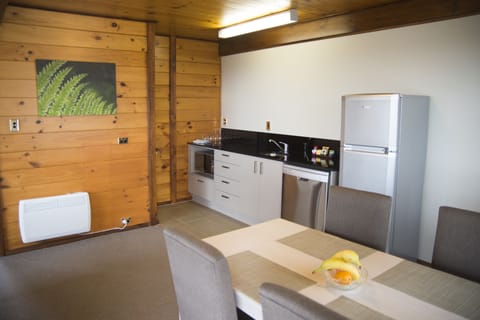 Garden Spa View Apartment | Private kitchen | Fridge, coffee/tea maker, paper towels