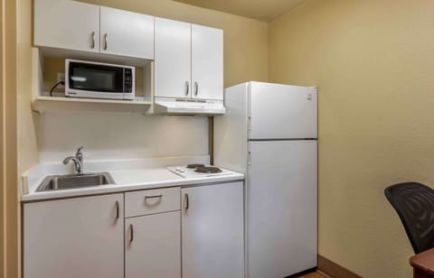 Studio, 1 Queen Bed, Non Smoking | Private kitchen | Full-size fridge, microwave, stovetop, coffee/tea maker