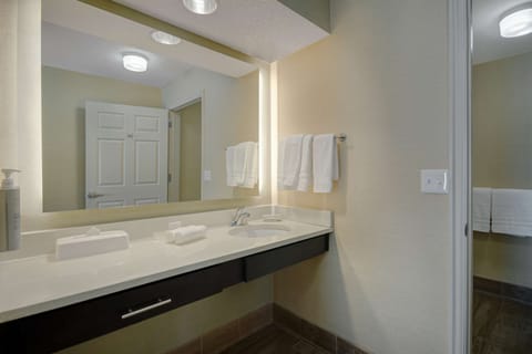 Suite, 1 King Bed, Accessible (Roll-in Shower) | Bathroom | Combined shower/tub, free toiletries, hair dryer, towels