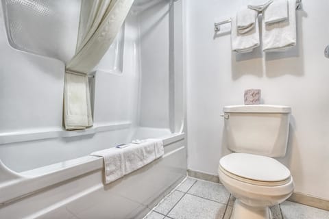 Combined shower/tub, hair dryer, towels, soap