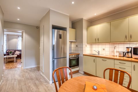 Comfort Apartment, 1 Bedroom | Private kitchen | Fridge, oven, stovetop, coffee/tea maker