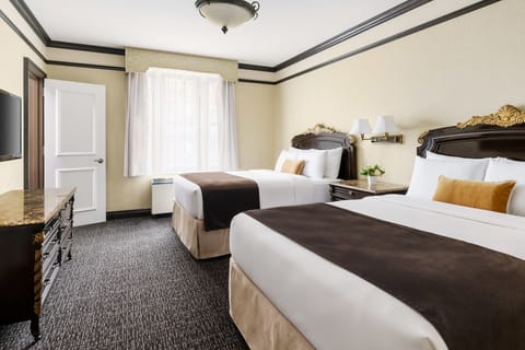 Deluxe Suite, 2 Queen Beds | Hypo-allergenic bedding, in-room safe, individually decorated, desk