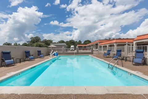 Seasonal outdoor pool, pool umbrellas, sun loungers