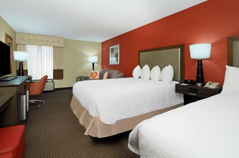 Suite, 2 Queen Beds, Non Smoking | Premium bedding, in-room safe, blackout drapes, free cribs/infant beds