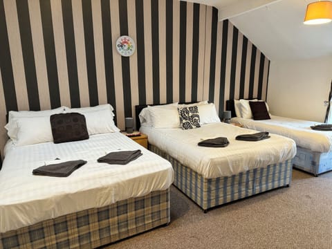 Family Room | Premium bedding, soundproofing, free WiFi, bed sheets