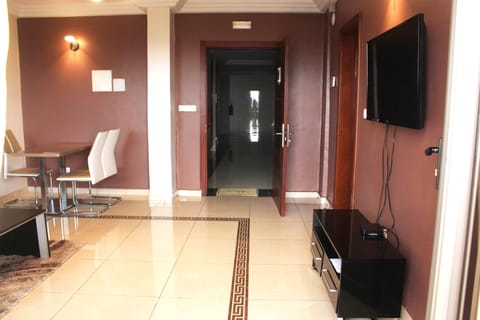 Apartment, 3 Bedrooms | Living room | 32-inch flat-screen TV with cable channels, TV