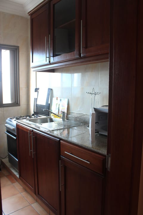 Apartment, 2 Bedrooms | Private kitchen | Fridge, microwave, stovetop, coffee/tea maker