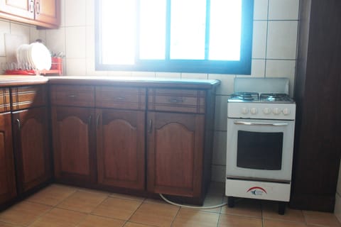 Apartment | Private kitchen | Mini-fridge, stovetop, coffee/tea maker, electric kettle