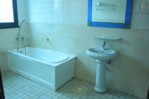 Apartment, 2 Bedrooms | Bathroom | Rainfall showerhead, bidet, towels, soap