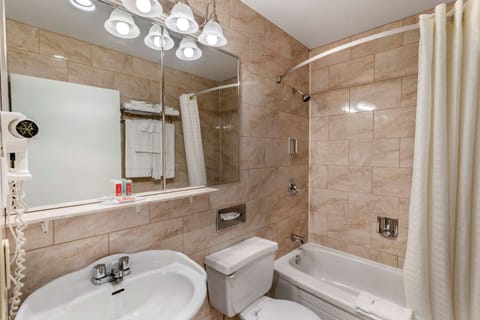 Room, 2 Queen Beds, Non Smoking, Jetted Tub | Bathroom | Combined shower/tub, hair dryer, towels, soap