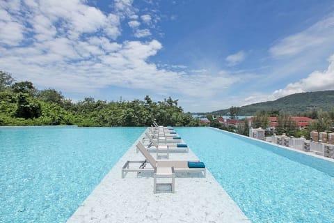 Outdoor pool, pool umbrellas, sun loungers