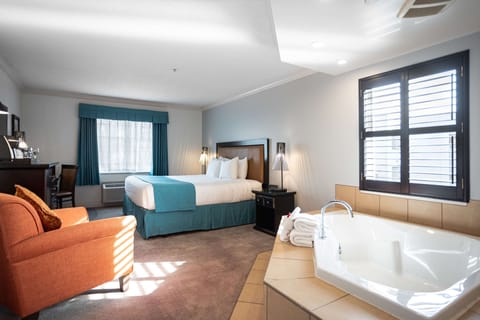 Suite, 1 King Bed, Non Smoking, Jetted Tub | Premium bedding, in-room safe, desk, blackout drapes
