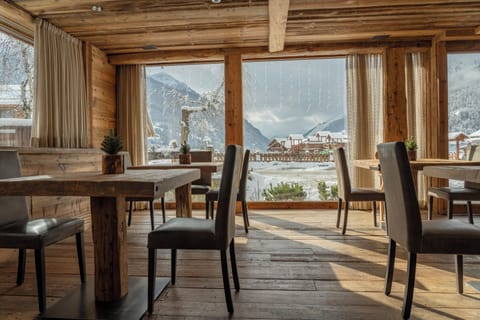 Lunch, dinner served; local cuisine, garden views 