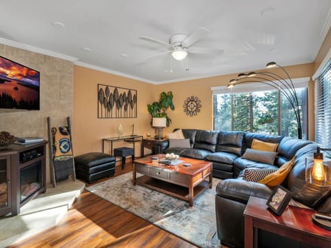 Beautiful comfortable living room area with large leather sectional