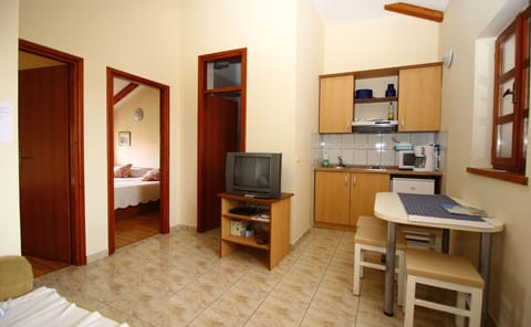 Apartment, Terrace, Sea View | Private kitchenette | Fridge, microwave, stovetop, espresso maker