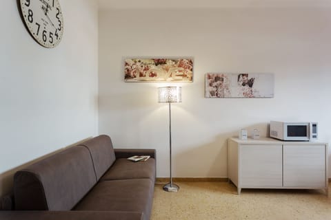 Apartment, 1 Bedroom | Living area | Flat-screen TV