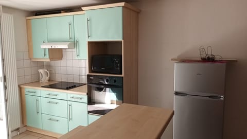 Family Apartment | Private kitchen | Fridge, microwave, highchair