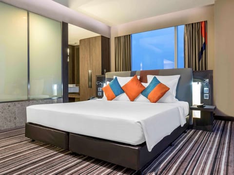 Premier Suite, 1 King Bed | Minibar, in-room safe, individually decorated, individually furnished