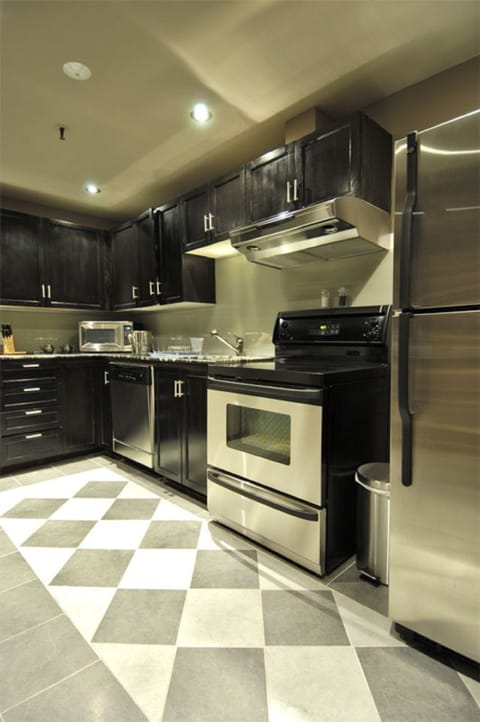 Deluxe Loft, 1 Bedroom | Private kitchen | Full-size fridge, microwave, stovetop, dishwasher
