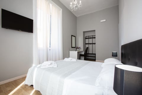 Double or Twin Room | Minibar, desk, soundproofing, iron/ironing board