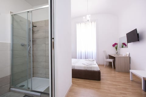 Double or Twin Room | Minibar, desk, soundproofing, iron/ironing board