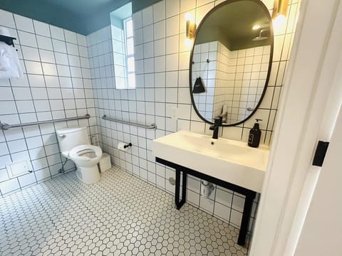 Accessible Queen Room | 230 SQ FT | Bathroom | Shower, designer toiletries, hair dryer, towels